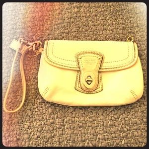 Cream Coach Wristlet w/ baby pink lining
