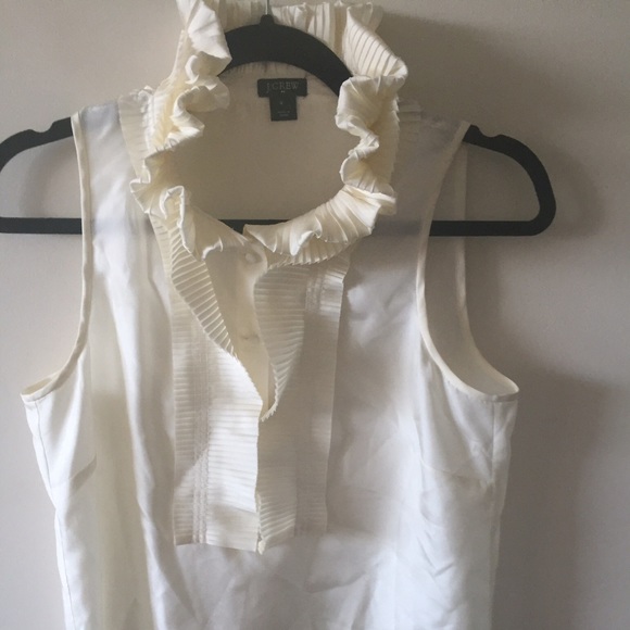 Cream silk J. Crew sleeveless blouse.