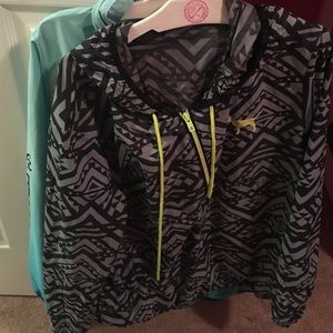 Aztec and blue windbreaker/rain jacket.