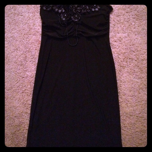 Black strapless dress with design. Never used