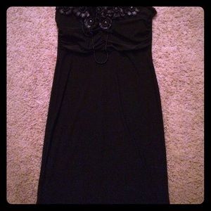 Black strapless dress with design. Never used
