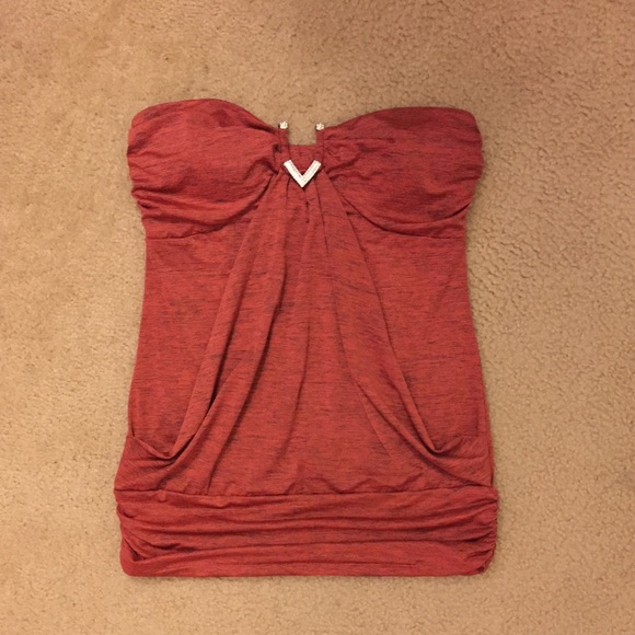 Strapless orange top with blingy embellishment!