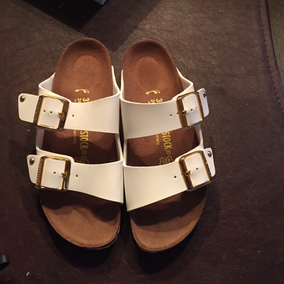 brand new white and gold Birkenstocks