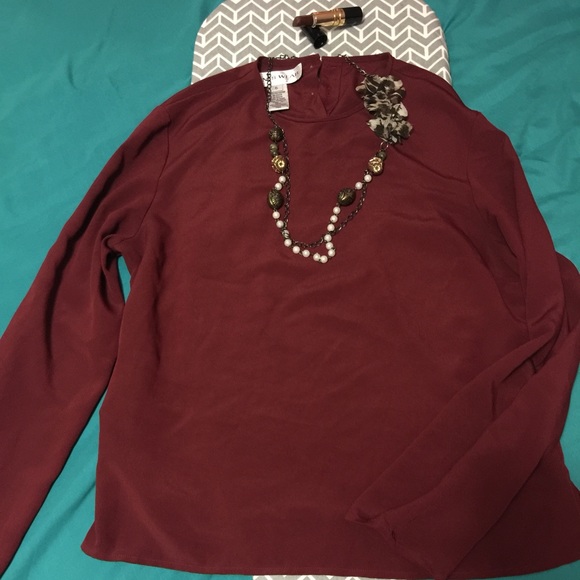 Maroon/burgundy type of shirt from Jones Wear