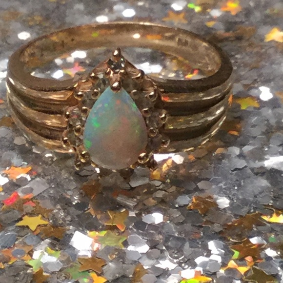Opal and diamond ring