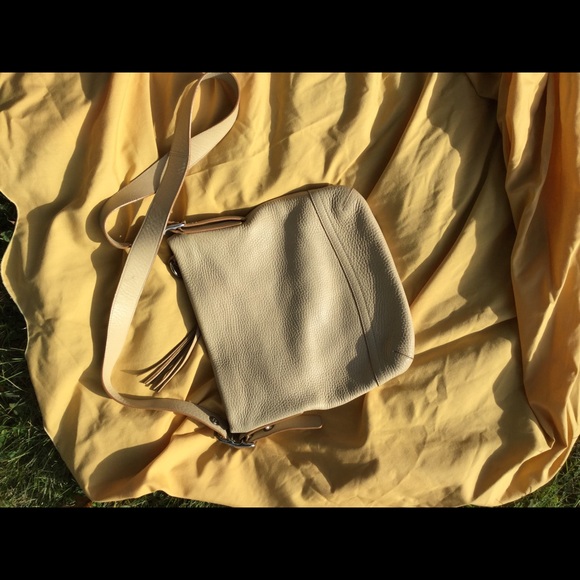 Coach cream pebbled leather with dust cover. EUC