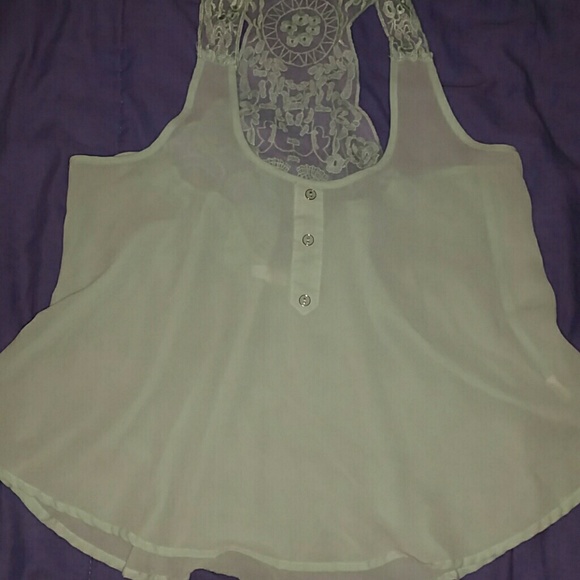 Mint sleeveless blouse with t-back detail