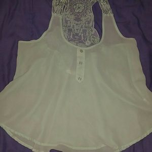 Mint sleeveless blouse with t-back detail