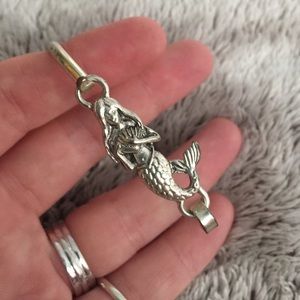 Silver mermaid bracelet.
