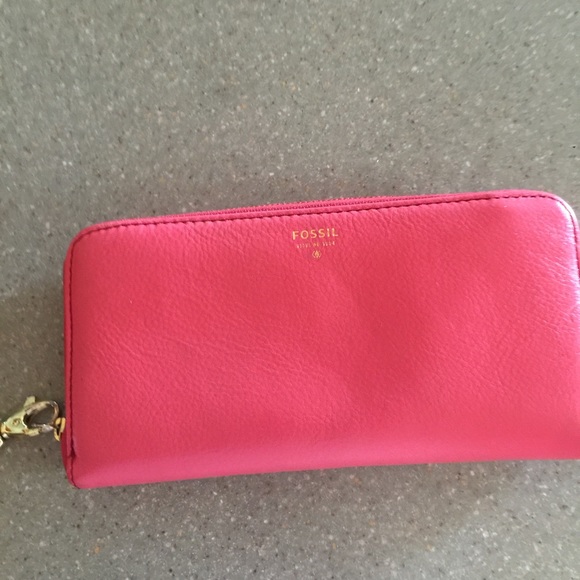Fossil wallet. Pink exterior. Orange interior.
