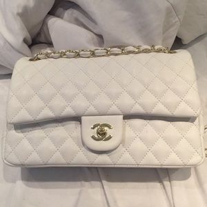 White quilted purse hasn't been used