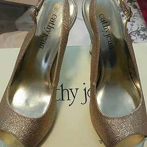 Peep toe gold platform heels
