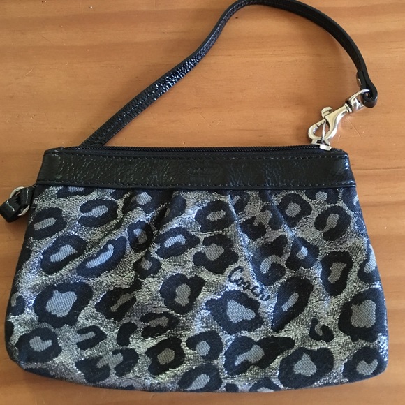 Coach ocelot medium wristlet, price reduced