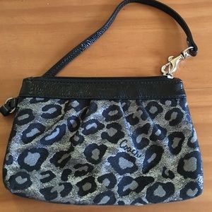Coach ocelot medium wristlet, price reduced