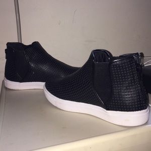Black high top sneakers