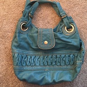 Like new turquoise rouched purse from Francesca's