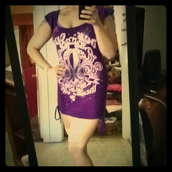 Beyonce mini purple dress.