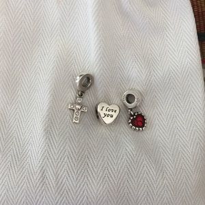 Cross, I love you, & Red heart Pandora charms