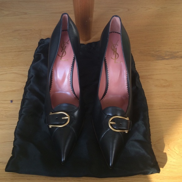 Vintage YSL black leather pumps. Never been worn.