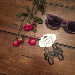 Black double scroll earrings.