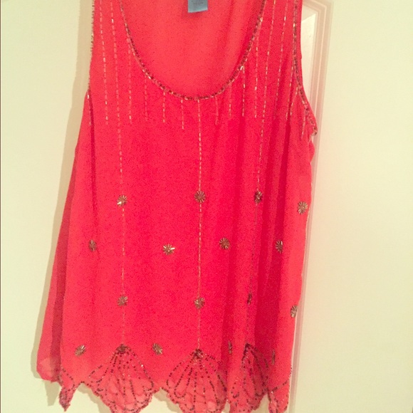 Orange top with beaded embellishment
