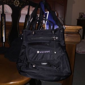 Sherpani black purse