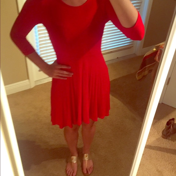 Stylish red dress with fitted sleeves