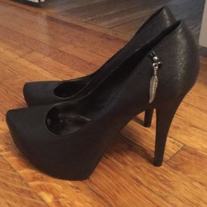 Never worn black Carlos Santana pumps