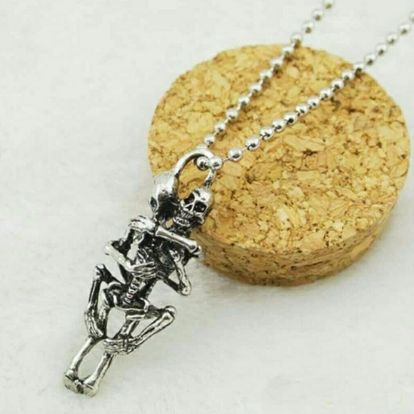 Delightfully funny silver Skelton necklace