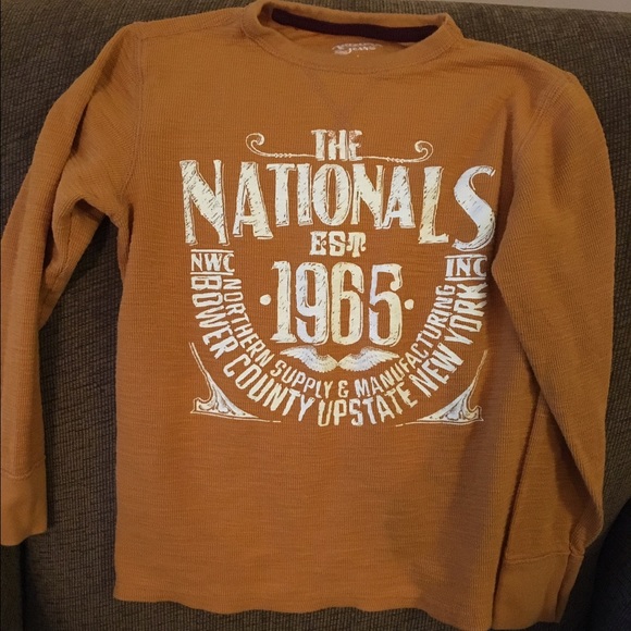 Boy's long sleeve waffle-knit shirt.
