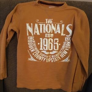 Boy's long sleeve waffle-knit shirt.