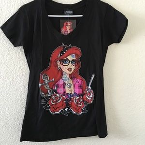 Black V-neck shirt featuring Ariel "tatted" up