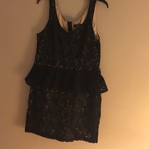 Black lace with a brown slip underneath