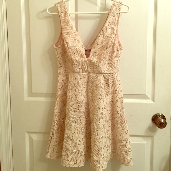 Cream colored dress with gold sequins