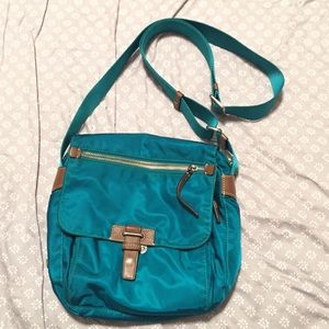 Tumi cross body purse