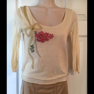 Light yellow Anthropologie top.