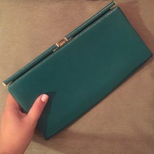 Emerald green and gold clutch