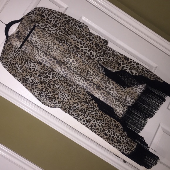 Leopard print kimono with black fringe.