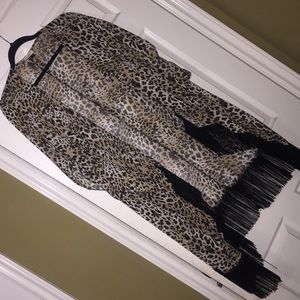 Leopard print kimono with black fringe.