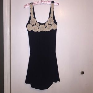 Star Vixen short dress with beautiful cream flower