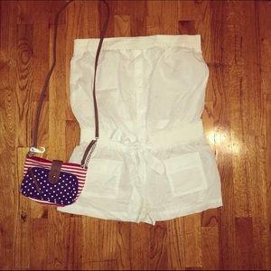 White cotton romper & American cross body purse.