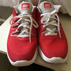 Red Nike training shoes