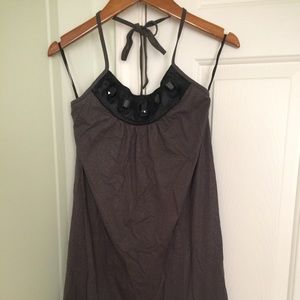 Mini sun dress in shimmery gray cotton fabric.