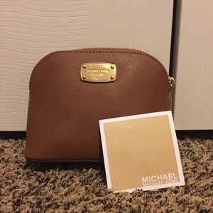 Michael Kors travel pouch.
