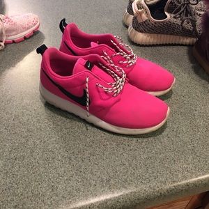 Pink roshe runs