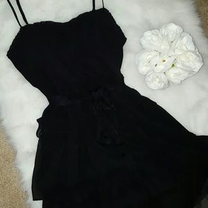 Ruffled black cocktail dress