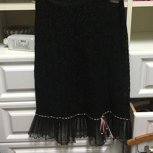 Cute black skirt with pink ribbon