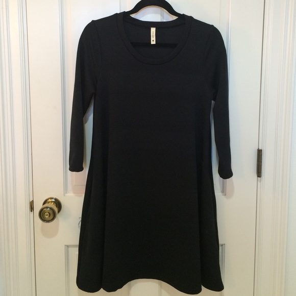 Tyche embossed swing dress. - Picture 1 of 4