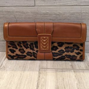 ColeHaan animal print clutch with brown leather.
