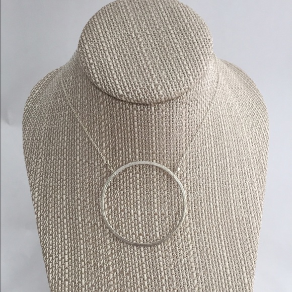 Silver karma circle necklace